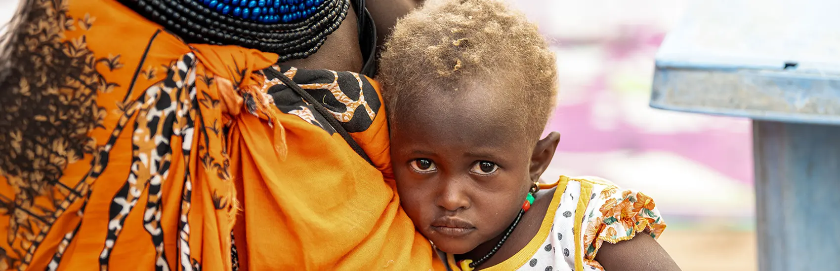A young child receiving nutrition support in Kenya